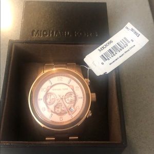 MK Rose gold watch .